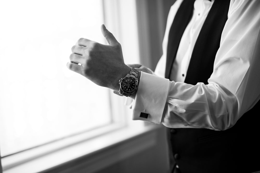 a groom wearing a watch